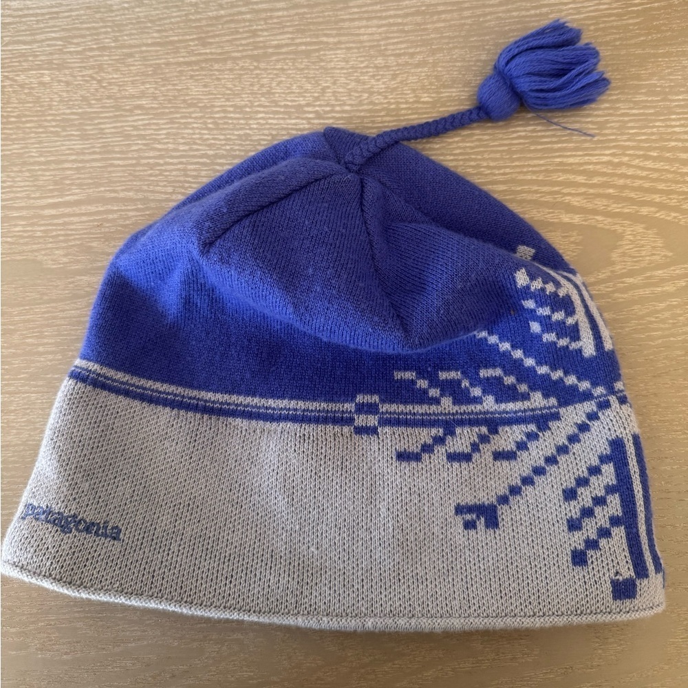 Patagonia Beanie Hat, snowflake design with small tassel top.